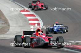 12.09.2004 Dijon, France, Sunday 12 September 2004, Alex Lloyd, GBR, John Village Automotive, leading the race in front of Fabrizio Del Monte, ITA, GP Racing, and Jonathan Reid, NZL, John Village Automotive, track, action - SUPERFUND EURO 3000 Championship Rd 7, Circuit Dijon-Prenois, France, FRA - SUPERFUND COPYRIGHT FREE editorial use only