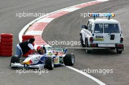 12.09.2004 Dijon, France, Sunday 12 September 2004, Norbert Siedler, AUT, ADM Motorsport, being towed away after spinning off - SUPERFUND EURO 3000 Championship Rd 7, Circuit Dijon-Prenois, France, FRA - SUPERFUND COPYRIGHT FREE editorial use only
