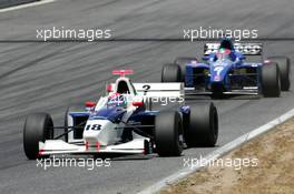 30.05.2004 Estoril, Portugal, Sunday 30 May 2004, Chistiano Tuka Rocha, BRA, Zele Racing, in front of Maxime Hodencq, BEL, GP Racing, track, action - SUPERFUND EURO 3000 Championship Rd 2, Estoril, Portugal, PRT - SUPERFUND COPYRIGHT FREE editorial use only