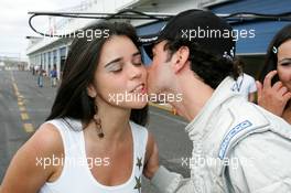 30.05.2004 Estoril, Portugal, Sunday 30 May 2004, As a real Brazilian, Chistiano Tuka Rocha, BRA, Zele Racing, portrait, thanked all the Superfund grid girls personally with a kiss - SUPERFUND EURO 3000 Championship Rd 2, Estoril, Portugal, PRT - SUPERFUND COPYRIGHT FREE editorial use only
