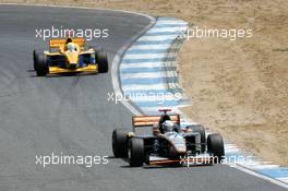 30.05.2004 Estoril, Portugal, Sunday 30 May 2004, "Babalus", ITA, Euro 3000 Traini Racing, track, action, in front of Nicky Pastorelli, NED, Draco Racing Jr. Team, track, action - SUPERFUND EURO 3000 Championship Rd 2, Estoril, Portugal, PRT - SUPERFUND COPYRIGHT FREE editorial use only