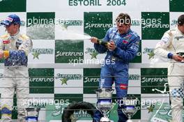 30.05.2004 Estoril, Portugal, Sunday 30 May 2004, Podium, Fabrizio Del Monte, ITA, GP Racing (1st, right), spraying champaign to Nicky Pastorelli, NED, Draco Racing Jr. Team (2nd, left) - SUPERFUND EURO 3000 Championship Rd 2, Estoril, Portugal, PRT - SUPERFUND COPYRIGHT FREE editorial use only