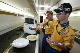 27.06.2004 Monza, Italy, Sunday 27 June 2004, Nicky Pastorelli, NED, Draco Racing Jr. Team and Fausto Ippoliti, ITA, Draco Racing Jr. team making themselves pasta for lunch - SUPERFUND EURO 3000 Championship Rd 4, Monza, Italy, ITA - SUPERFUND COPYRIGHT FREE editorial use only