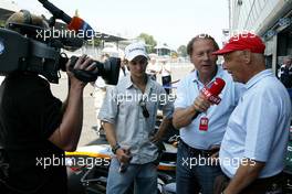 27.06.2004 Monza, Italy, Sunday 27 June 2004, Niki Lauda and Mathias Lauda, AUT, Euro 3000 Traini Racing being interviewed by Heiz Proeller ORF presenter - SUPERFUND EURO 3000 Championship Rd 4, Monza, Italy, ITA - SUPERFUND COPYRIGHT FREE editorial use only