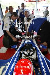 27.06.2004 Monza, Italy, Sunday 27 June 2004, Norbert Siedler, AUT, ADM Motorsport has some adjustments made to his car - SUPERFUND EURO 3000 Championship Rd 4, Monza, Italy, ITA - SUPERFUND COPYRIGHT FREE editorial use only