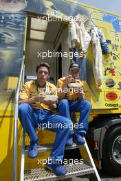 27.06.2004 Monza, Italy, Sunday 27 June 2004, Nicky Pastorelli, NED, Draco Racing Jr. Team and Fausto Ippoliti, ITA, Draco Racing Jr. team having pasta for lunch - SUPERFUND EURO 3000 Championship Rd 4, Monza, Italy, ITA - SUPERFUND COPYRIGHT FREE editorial use only