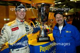 31.10.2004 Nurburgring, Germany, Sunday, 31 October 2004, Nicky Pastorelli, NED, Draco Racing Jr. Team Champion of the SUPERFUND EURO 30 00 Championship and his father - SUPERFUND EURO 3000 Championship Rd 10, Nurburgring, Germany, GER - SUPERFUND COPYRIGHT FREE editorial use only