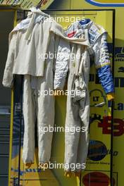 18.07.2004 Spa, Belgium, Sunday 18 July 2004, Overalls are left out in the sun to dry out from a sweaty hot session - SUPERFUND EURO 3000 Championship Rd 5, Spa Francorchamps, Belgium, BEL - SUPERFUND COPYRIGHT FREE editorial use only
