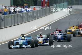18.07.2004 Spa, Belgium, Sunday 18 July 2004, The Start of the race and Nicky Pastorelli, NED, Draco Racing Jr. Team gets past Norbert Siedler, AUT, ADM Motorsport - SUPERFUND EURO 3000 Championship Rd 5, Spa Francorchamps, Belgium, BEL - SUPERFUND COPYRIGHT FREE editorial use only