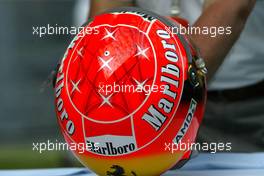 05.03.2004 Melbourne, Australia, F1, Friday, March, Michael Schumache r, GER, Ferrari Helmet. Formula 1 World Championship, Rd 1, Australian Grand Prix. www.xpb.cc, EMail: info@xpb.cc - copy of publication required for printed pictures. Every used picture is fee-liable. c Copyright: photo4 / xpb.cc - LEGAL NOTICE: THIS PICTURE IS NOT FOR ITALY  AND GREECE  PRINT USE, KEINE PRINT BILDNUTZUNG IN ITALIEN  UND  GRIECHENLAND!