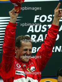 07.03.2004 Melbourne, Australia, F1, Sunday, March, Podium, Michael Schumacher, GER, Ferrari, Portrait, Formula 1 World Championship, Rd 1, Australian Grand Prix. www.xpb.cc, EMail: info@xpb.cc - copy of publication required for printed pictures. Every used picture is fee-liable. c Copyright: photo4 / xpb.cc - LEGAL NOTICE: THIS PICTURE IS NOT FOR ITALY PRINT USE, KEINE PRINT BILDNUTZUNG IN ITALIEN!