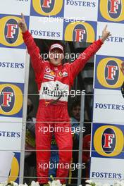 07.03.2004 Melbourne, Australia, F1, Sunday, March, Podium, Michael Schumacher, GER, Ferrari celebrates his first win of 2004. Formula 1 World Championship, Rd 1, Australian Grand Prix. www.xpb.cc, EMail: info@xpb.cc - copy of publication required for printed pictures. Every used picture is fee-liable. c Copyright: xpb.cc