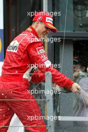 07.03.2004 Melbourne, Australia, F1, Sunday, March, Podium, Michael Schumacher, GER, Ferrari celebrates his first win of 2004. Formula 1 World Championship, Rd 1, Australian Grand Prix. www.xpb.cc, EMail: info@xpb.cc - copy of publication required for printed pictures. Every used picture is fee-liable. c Copyright: xpb.cc