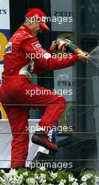 07.03.2004 Melbourne, Australia, F1, Sunday, March, Podium, Michael Schumacher, GER, Ferrari, Portrait, Formula 1 World Championship, Rd 1, Australian Grand Prix. www.xpb.cc, EMail: info@xpb.cc - copy of publication required for printed pictures. Every used picture is fee-liable. c Copyright: photo4 / xpb.cc - LEGAL NOTICE: THIS PICTURE IS NOT FOR ITALY PRINT USE, KEINE PRINT BILDNUTZUNG IN ITALIEN!