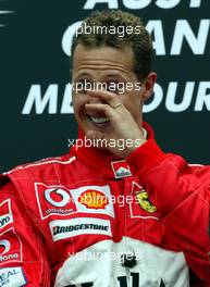 07.03.2004 Melbourne, Australia, F1, Sunday, March, Podium, Michael Schumacher, GER, Ferrari, Portrait, Formula 1 World Championship, Rd 1, Australian Grand Prix. www.xpb.cc, EMail: info@xpb.cc - copy of publication required for printed pictures. Every used picture is fee-liable. c Copyright: photo4 / xpb.cc - LEGAL NOTICE: THIS PICTURE IS NOT FOR ITALY PRINT USE, KEINE PRINT BILDNUTZUNG IN ITALIEN!