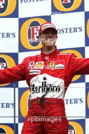 07.03.2004 Melbourne, Australia, F1, Sunday, March, Podium, Michael Schumacher, GER, Ferrari celebrates his first win of 2004.  Formula 1 World Championship, Rd 1, Australian Grand Prix. www.xpb.cc, EMail: info@xpb.cc - copy of publication required for printed pictures. Every used picture is fee-liable. c Copyright: xpb.cc