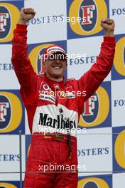 07.03.2004 Melbourne, Australia, F1, Sunday, March, Podium, Michael Schumacher, GER, Ferrari celebrates his first win of 2004.  Formula 1 World Championship, Rd 1, Australian Grand Prix. www.xpb.cc, EMail: info@xpb.cc - copy of publication required for printed pictures. Every used picture is fee-liable. c Copyright: xpb.cc