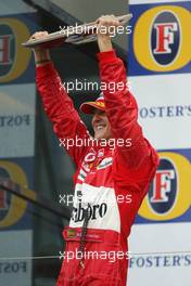 07.03.2004 Melbourne, Australia, F1, Sunday, March, Podium, Michael Schumacher, GER, Ferrari celebrates his first win of 2004. Formula 1 World Championship, Rd 1, Australian Grand Prix. www.xpb.cc, EMail: info@xpb.cc - copy of publication required for printed pictures. Every used picture is fee-liable. c Copyright: xpb.cc