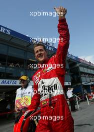 06.03.2004 Melbourne, Australia, F1, Saturday, March, Michael Schumacher, GER, Ferrari, celebrating after winning the Qualifying, Formula 1 World Championship, Rd 1, Australian Grand Prix. www.xpb.cc, EMail: info@xpb.cc - copy of publication required for printed pictures. Every used picture is fee-liable. c Copyright: xpb.cc