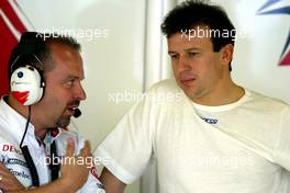 06.03.2004 Melbourne, Australia, F1, Saturday, March, Practice,  Mike Gascoyne, GBR, Toyota Racing technical director talks with Olivier Panis, FRA, Panasonic Toyota Racing, TF104, Pitlane, Box, Garage. Formula 1 World Championship, Rd 1, Australian Grand Prix. www.xpb.cc, EMail: info@xpb.cc - copy of publication required for printed pictures. Every used picture is fee-liable. c Copyright: xpb.cc