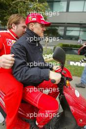 07.03.2004 Melbourne, Australia, F1, Sunday, March, Michael Schumacher, GER, Ferrarri rides on a moped, scooter. Formula 1 World Championship, Rd 1, Australian Grand Prix. www.xpb.cc, EMail: info@xpb.cc - copy of publication required for printed pictures. Every used picture is fee-liable. c Copyright: xpb.cc