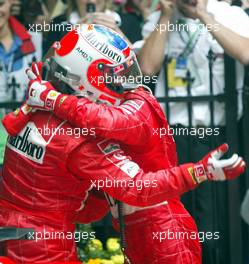 07.03.2004 Melbourne, Australia, F1, Sunday, March, Michael Schumacher, GER, Ferrari, with Rubens Barrichello, BRA, Ferrari, in the Park Ferme, Formula 1 World Championship, Rd 1, Australian Grand Prix. www.xpb.cc, EMail: info@xpb.cc - copy of publication required for printed pictures. Every used picture is fee-liable. c Copyright: xpb.cc