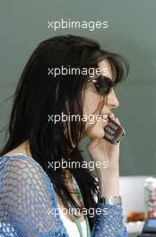 04.03.2004 Melbourne, Australia, F1, Thursday, March, Connie Montoya, Wife of Juan Pablo Montoya,  on the mobile phone. Formula 1 World Championship, Rd 1, Australian Grand Prix. www.xpb.cc, EMail: info@xpb.cc - copy of publication required for printed pictures. Every used picture is fee-liable. c Copyright: xpb.cc