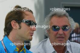 04.03.2004 Melbourne, Australia, F1, Thursday, March, Jarno Trulli, ITA, Renault F1 Team and Flavio Briatore, ITA, Renault, Teamchief, Managing Director. Formula 1 World Championship, Rd 1, Australian Grand Prix. www.xpb.cc, EMail: info@xpb.cc - copy of publication required for printed pictures. Every used picture is fee-liable. c Copyright: reporter images / xpb.cc - LEGAL NOTICE: THIS PICTURE IS NOT FOR GREECE PRINT USE, KEINE PRINT BILDNUTZUNG IN GRIECHENLAND!