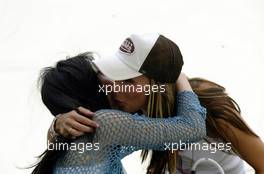 04.03.2004 Melbourne, Australia, F1, Thursday, March, Connie Montoya, girl friend, Girlfriend of Juan Pablo Montoya, kissing Cora Schumacher, GER, Wife of Ralf Schumacher, Portrait ,Formula 1 World Championship, Rd 1, Australian Grand Prix. www.xpb.cc, EMail: info@xpb.cc - copy of publication required for printed pictures. Every used picture is fee-liable. c Copyright: Kucera / xpb.cc - LEGAL NOTICE: THIS PICTURE IS NOT FOR AUSTRIA PRINT USE, KEINE PRINT BILDNUTZUNG IN OESTERREICH!