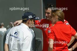 04.03.2004 Melbourne, Australia, F1, Thursday, March,  Juan-Pablo Montoya, COL, BMW WilliamsF1 talks with some of the Ferrari team. Formula 1 World Championship, Rd 1, Australian Grand Prix. www.xpb.cc, EMail: info@xpb.cc - copy of publication required for printed pictures. Every used picture is fee-liable. c Copyright: xpb.cc