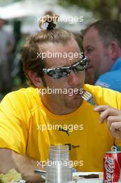 04.03.2004 Melbourne, Australia, F1, Thursday, March, Jarno Trulli, ITA, Renault F1 Team tucks into his breakfast. Formula 1 World Championship, Rd 1, Australian Grand Prix. www.xpb.cc, EMail: info@xpb.cc - copy of publication required for printed pictures. Every used picture is fee-liable. c Copyright: photo4 / xpb.cc - LEGAL NOTICE: THIS PICTURE IS NOT FOR ITALY  AND GREECE  PRINT USE, KEINE PRINT BILDNUTZUNG IN ITALIEN  UND  GRIECHENLAND! 