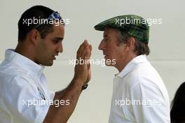 04.03.2004 Melbourne, Australia, F1, Thursday, March, Juan-Pablo Montoya, COL, and Jackie Stewart, GBR, have a chat. Formula 1 World Championship, Rd 1, Australian Grand Prix. www.xpb.cc, EMail: info@xpb.cc - copy of publication required for printed pictures. Every used picture is fee-liable. c Copyright: xpb.cc