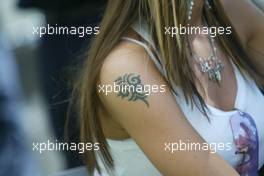 04.03.2004 Melbourne, Australia, F1, Thursday, March, Cora Schumacher, GER, Wife of Ralf Schumacher, tatoo. Formula 1 World Championship, Rd 1, Australian Grand Prix. www.xpb.cc, EMail: info@xpb.cc - copy of publication required for printed pictures. Every used picture is fee-liable. c Copyright: xpb.cc