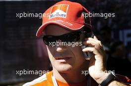 04.03.2004 Melbourne, Australia, F1, Thursday, March, Rubens Barrichello, BRA, Ferrari makes a mobile phone call. Formula 1 World Championship, Rd 1, Australian Grand Prix. www.xpb.cc, EMail: info@xpb.cc - copy of publication required for printed pictures. Every used picture is fee-liable. c Copyright: xpb.cc