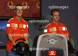 04.03.2004 Melbourne, Australia, F1, Thursday, March, Vodafone Event "Head2Head Challenge" at Vodafone Arena, Station, Michael Schumacher, GER, Ferrari, Rubens Barrichello, BRA, Ferrari - Formula 1 World Championship, Rd 1, Australian Grand Prix. www.xpb.cc, EMail: info@xpb.cc - copy of publication required for printed pictures. Every used picture is fee-liable. c Copyright: xpb.cc