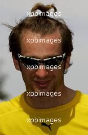 03.03.2004 Melbourne, Australia, F1, Wednesday, March, Jarno Trulli, ITA, Renault F1 Team, with a different hair style. Formula 1 World Championship, Rd 1, Australian Grand Prix preparations. www.xpb.cc, EMail: info@xpb.cc - copy of publication required for printed pictures. Every used picture is fee-liable. c Copyright: xpb.cc