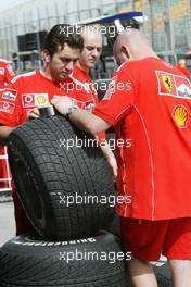 03.03.2004 Melbourne, Australia, F1, Wednesday, March, The ferrari team prepare their Bridgestone wet tyres for this weekend's racing. Formula 1 World Championship, Rd 1, Australian Grand Prix preparations. www.xpb.cc, EMail: info@xpb.cc - copy of publication required for printed pictures. Every used picture is fee-liable. c Copyright: xpb.cc