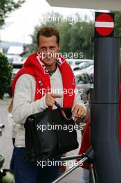 27.08.2004 Spa-Francorchamps, Belgium,  F1, Friday, Michael Schumacher (GER), Scuderia Ferrari Marlboro, Portrait, going through the security gates at the paddock entry - Formula 1 World Championship, Rd 14, Belgium Grand Prix, BEL, Belgium