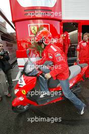 26.08.2004 Spa-Francorchamps, Belgium, F1, Thursday, August, Michael Schumacher, GER, Ferrari takes his scooter to go around the circuit - Formula 1 World Championship, Rd 14, Belgium Grand Prix, BEL, Belgium