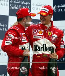 04.04.2004 Manama, Bahrain, F1, Sunday, April, Rubens Barrichello, BRA, Ferrari, Michael Schumacher, GER, Ferrari, Formula 1 World Championship, Podium, Rd 3, Bahrain Grand Prix, BHR