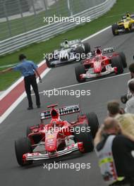 04.04.2004 Manama, Bahrain, F1, Sunday, April, Michael Schumacher, GER, Ferrari, Rubens Barrichello, BRA, Ferrari, Ralf Schumacher, GER, BMW WilliamsF1, Formula 1 World Championship, Race, Rd 3, Bahrain Grand Prix, BHR