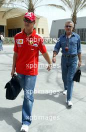 01.04.2004 Manama, Bahrain, F1, Thursday, April, Michael Schumacher, GER, Ferrari, and Willi Weber, GER, Driver - Manager, Portrait, Formula 1 World Championship, Rd 3, Bahrain Grand Prix, BHR