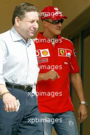 01.04.2004 Manama, Bahrain, F1, Thursday, April, Michael Schumacher, GER, Ferrari and Jean Todt, FRA, Ferrari, Teamchief, General Manager, GES, Formula 1 World Championship, Rd 3, Bahrain Grand Prix, BHR