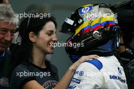 24.10.2004 Interlagos, Brazil, F1, Sunday, October, Connie Montoya, Wife of Juan Pablo Montoya and Juan-Pablo Montoya, COL, BMW WilliamsF1 - Formula 1 World Championship, Rd 18, Brazilian Grand Prix, BRA, Brazil, Podium