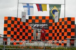 24.10.2004 Interlagos, Brazil, F1, Sunday, October, Kimi Raikkonen, FIN, Räikkönen, McLaren Mercedes with Juan-Pablo Montoya, COL, BMW WilliamsF1 and Rubens Barrichello, BRA, Ferrari - Formula 1 World Championship, Rd 18, Brazilian Grand Prix, BRA, Brazil, Podium