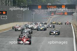 24.10.2004 Interlagos, Brazil, F1, Sunday, October, Rubens Barrichello, BRA, Ferrari leads The Start of the race - Formula 1 World Championship, Rd 18, Brazilian Grand Prix, BRA, Brazil, Race