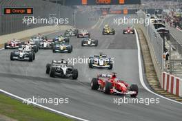 24.10.2004 Interlagos, Brazil, F1, Sunday, October, Rubens Barrichello, BRA, Ferrari leads The Start of the race - Formula 1 World Championship, Rd 18, Brazilian Grand Prix, BRA, Brazil, Race