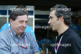 23.10.2004 Interlagos, Brazil, F1, Saturday, October, Patrick Faure, FRA. Head of Renault F1 talks with Pedro Diniz, BRA, Ex-Formula 1 driver - Formula 1 World Championship, Rd 18, Brazilian Grand Prix, BRA, Brazil