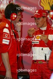 11.06.2004 Montreal, Canada, F1, Friday, June, Chris Dyer GBR, Ferrari Race Engineer with Michael Schumacher, GER, Ferrari - Formula 1 World Championship, Practice, Rd 8, Canadian Grand Prix, Canada, CAN