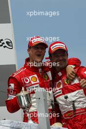 13.06.2004 Montreal, Canada, F1, Sunday, June, Michael Schumacher, GER, Ferrari and Rubens Barrichello, BRA, Ferrari - Formula 1 World Championship, Podium, Rd 8, Canadian Grand Prix, Canada, CAN